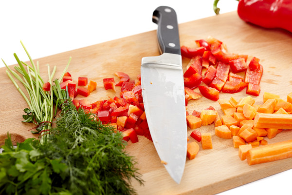Knife and chopped vegetables