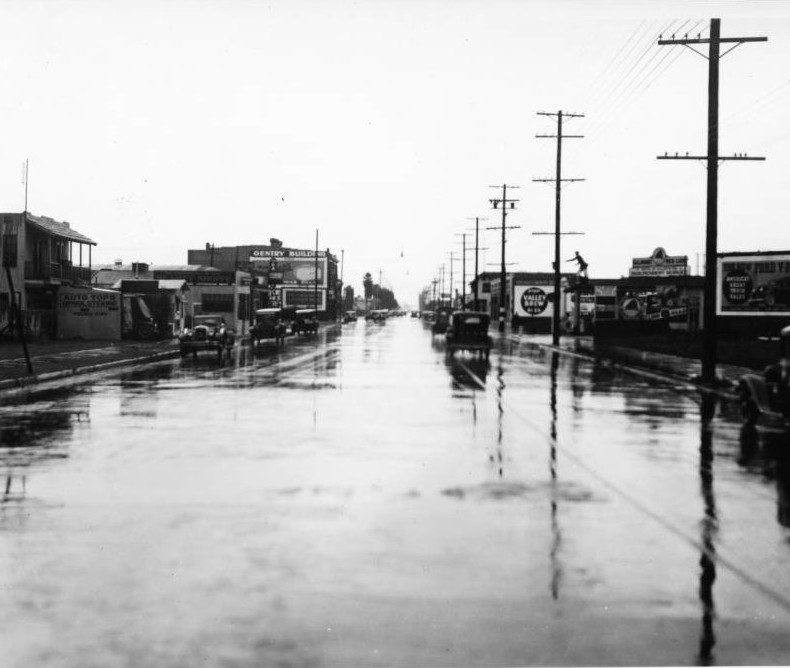 A view of unflooded Slauson Avenue west of  Third Avenue after storm drain construction, late 1930s
