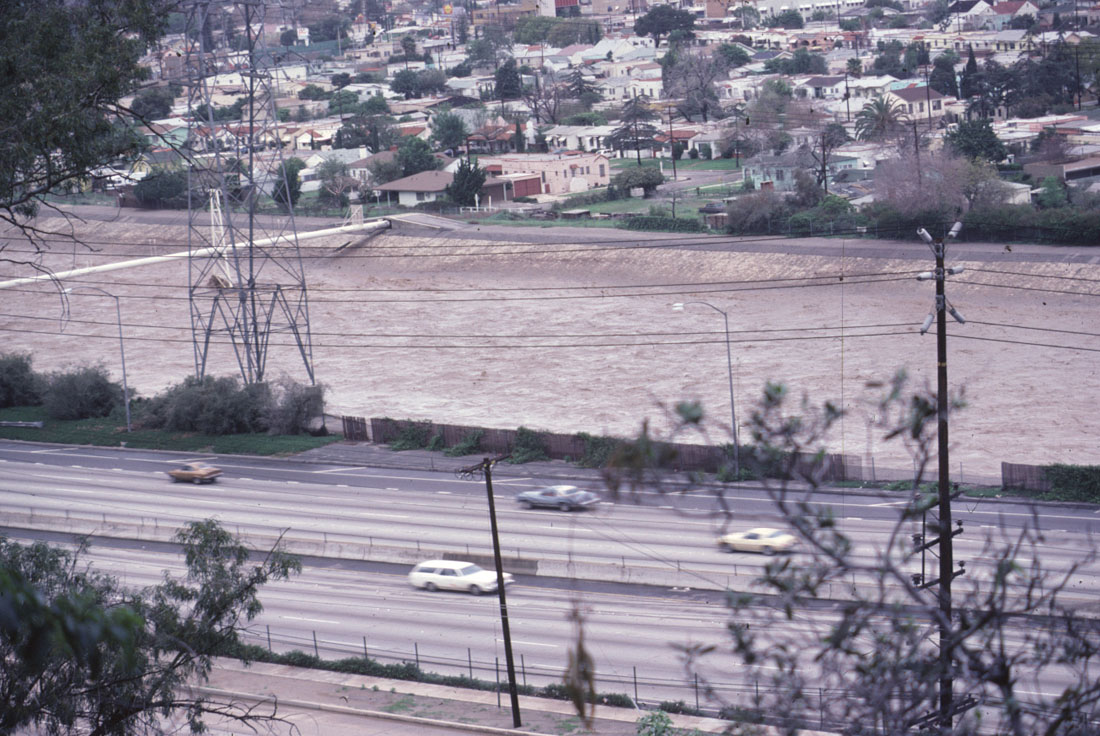 After two days of heavy rain, severe flooding causes the Los Angeles River to swell to heights rarely seen, 1978